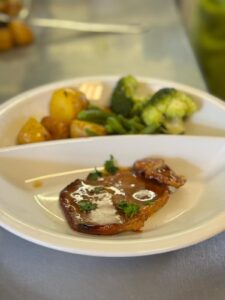 Honey Garlic Pork Chops with Fresh Vegetables. Available at 1 Oak Community Meals