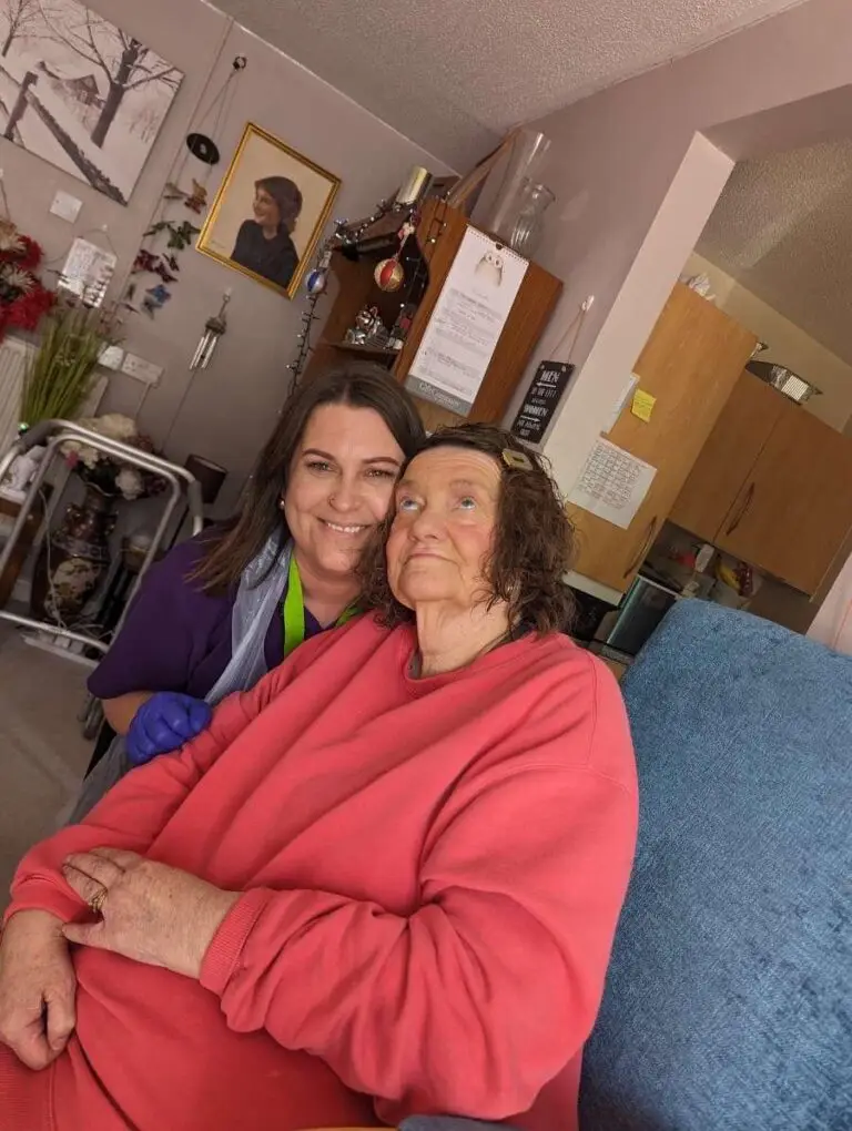 Fun times in a Sudbury Home Care client front room, happy carer and happy client
